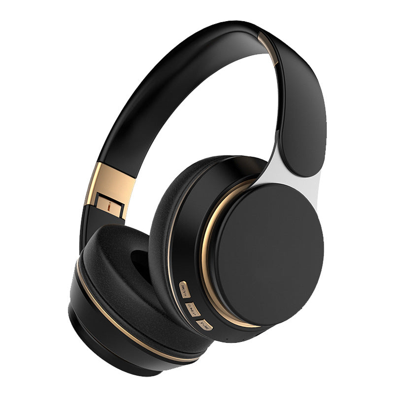 Black over-ear headphones with gold accents on a white background