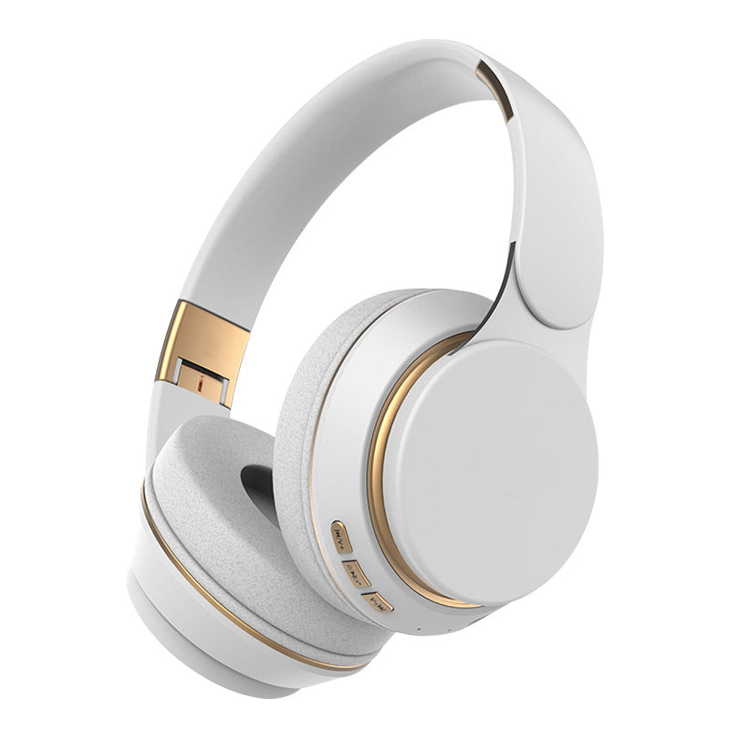 White headphones with gold accents on a white background